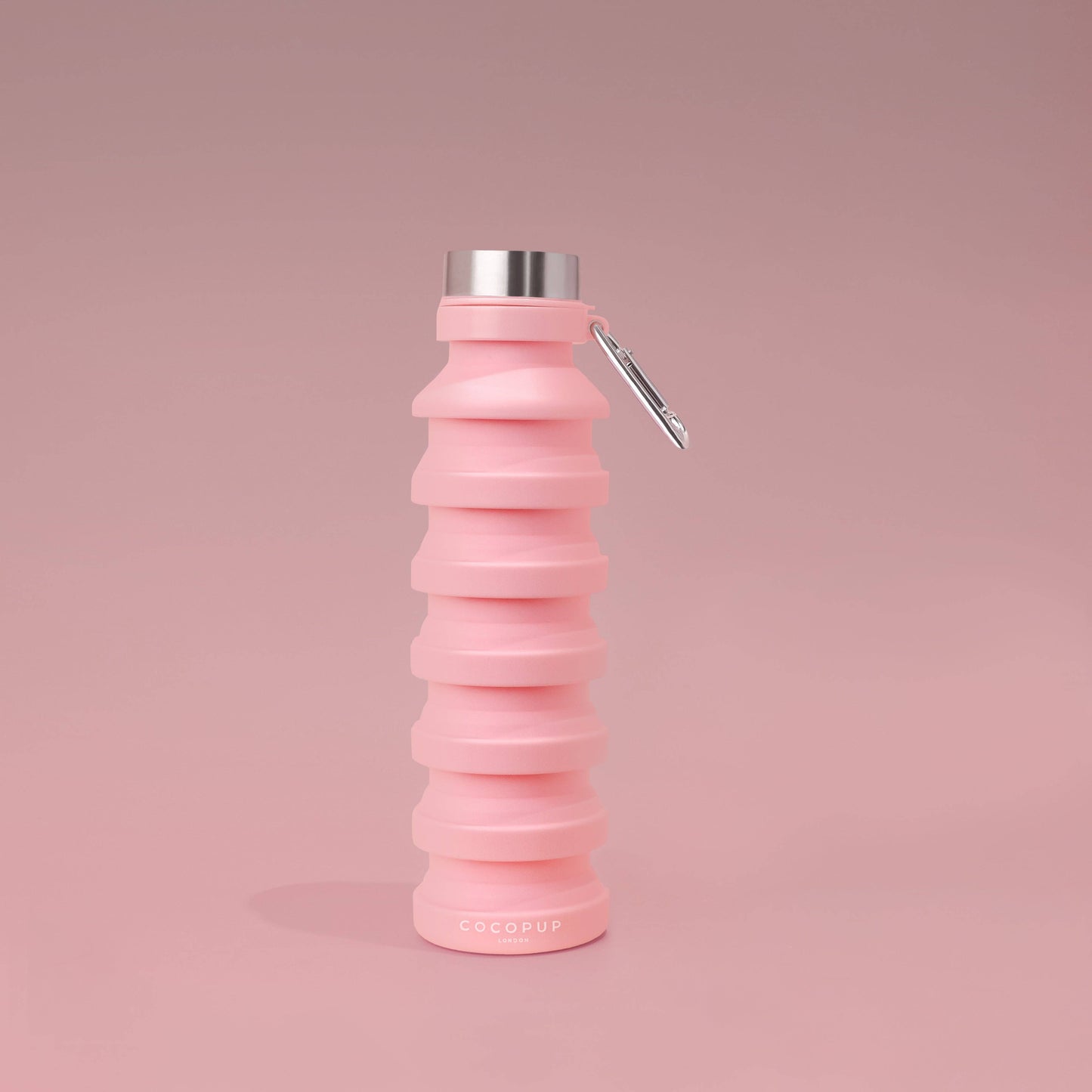 Faltbare Wasserflasche in Rosa – kompakt und praktisch für unterwegs.