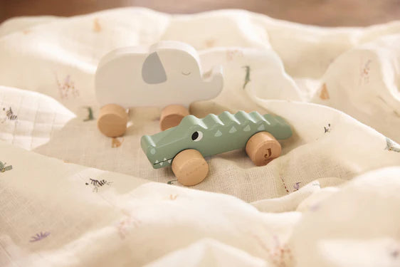 Dieser Elefant aus Holz ist das perfekte Spielzeug, um deinem Baby eine frühe Liebe zu Tieren und Bewegung zu vermitteln.