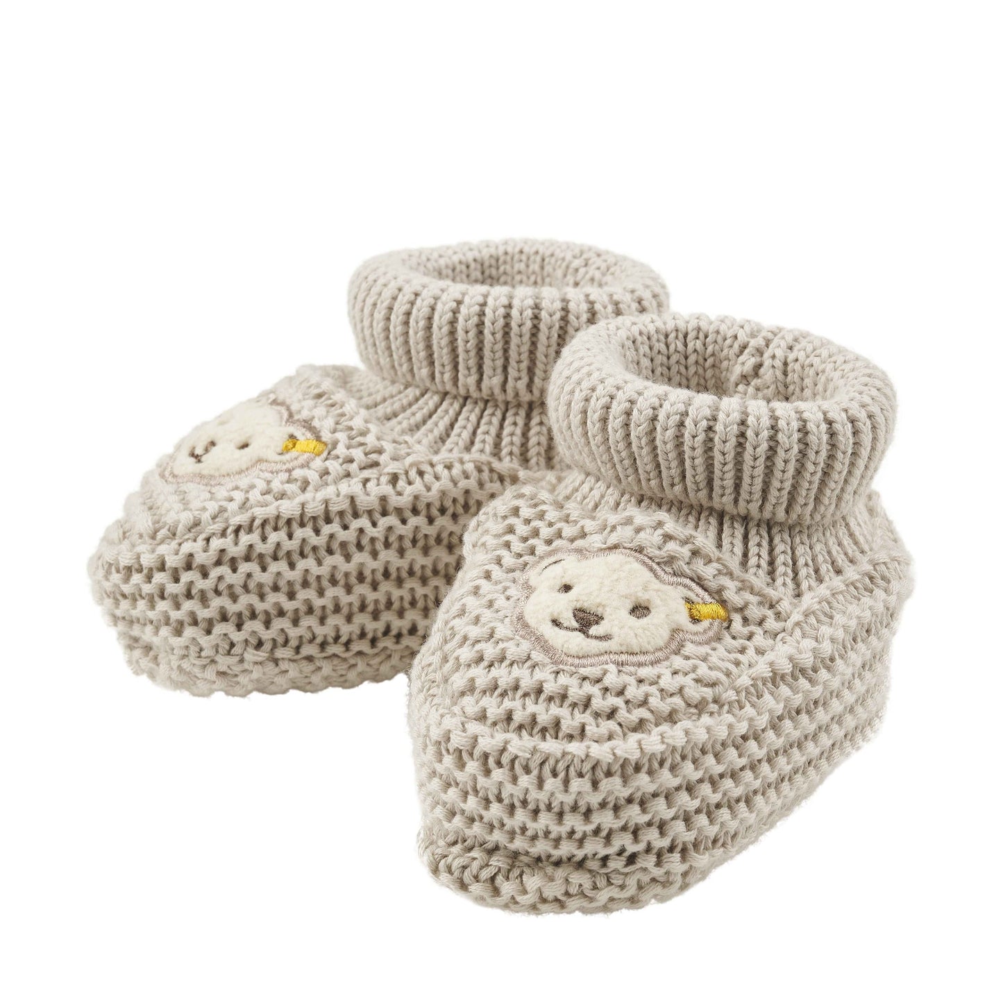 Weiche Babyschuhe von Steiff aus GOTS-zertifizierter Baumwolle – ideal für die ersten Schritte deines kleinen Lieblings.