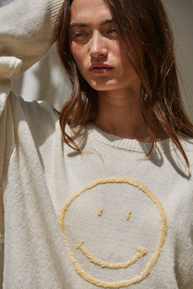 Wollpullover mit gesticktem Smiley
