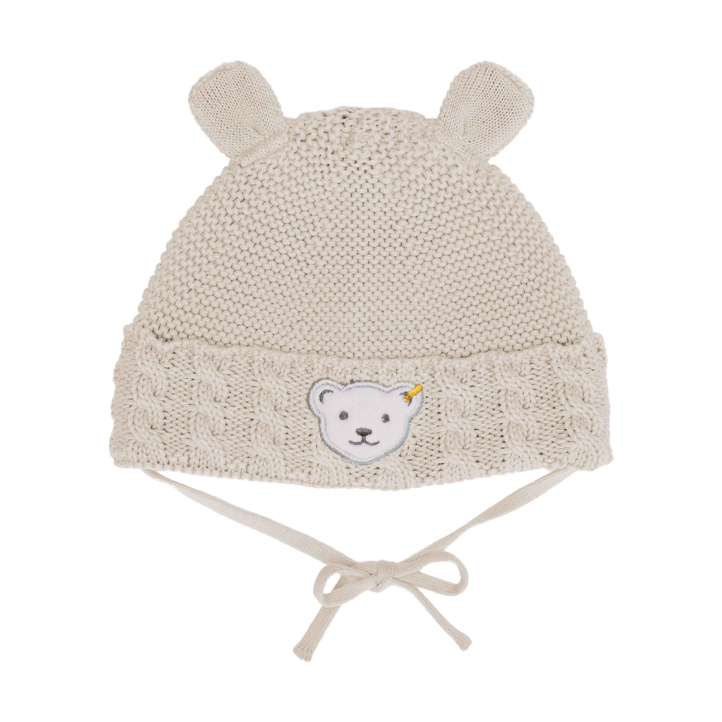 Weiche Steiff Baby-Mütze in Beige (Wind Chime) mit niedlichem Bärenmotiv und Knoten-Design.