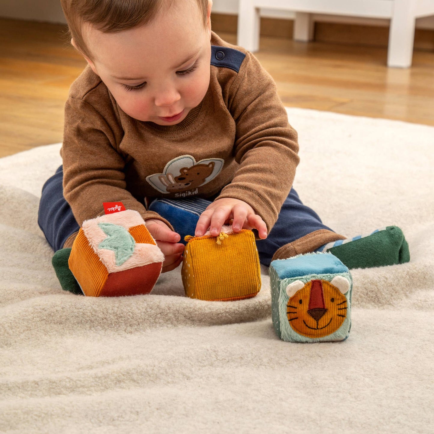 Motorikspielzeug für Babys – Aktiv-Würfel-Set von Sigikid.