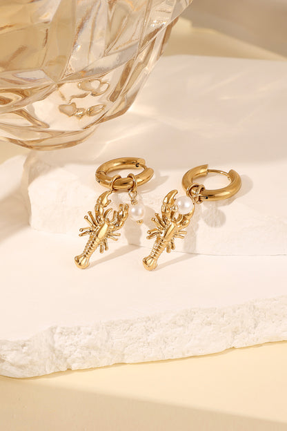 Sommerliche Creolen in Gold mit Perlendetail