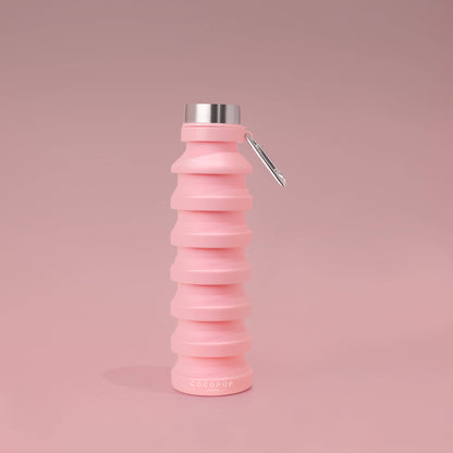 Faltbare Wasserflasche in Rosa – kompakt und praktisch für unterwegs.