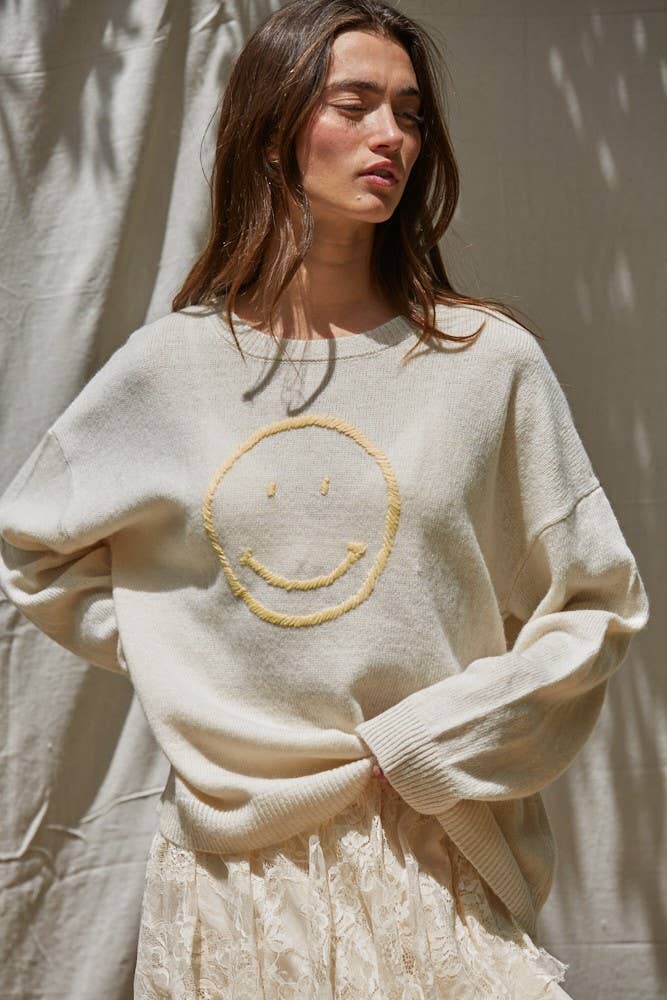 Wollpullover mit gesticktem Smiley