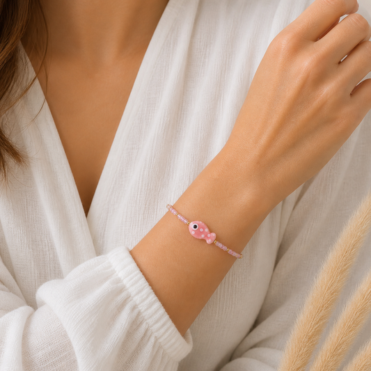 Fisch Armband in Rosa mit Perlen & Gold-Details
