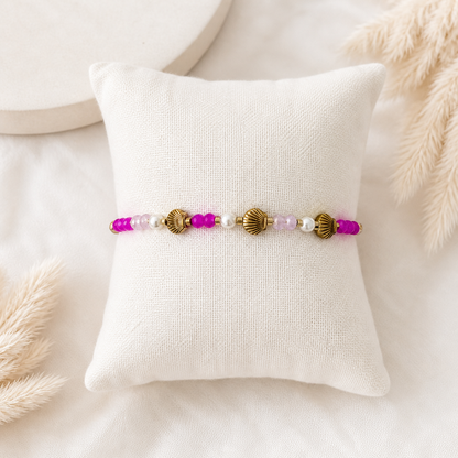 Perlenarmband mit Muschel-Details in Pink & Gold