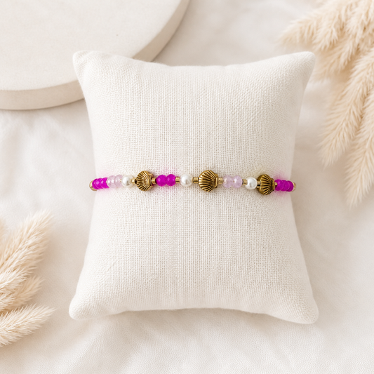 Perlenarmband mit Muschel-Details in Pink & Gold