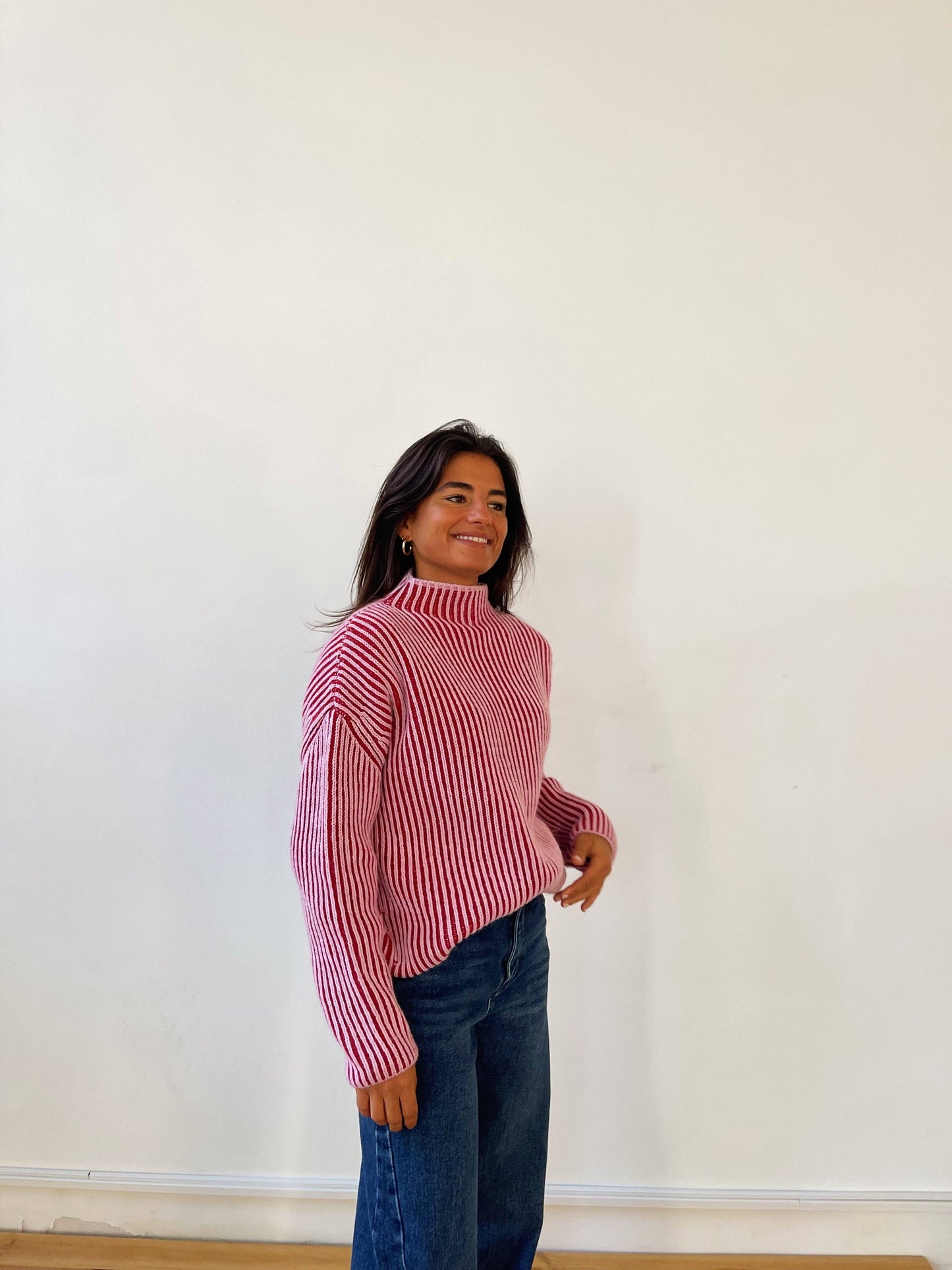 Rosa gestreifter Winterpullover
